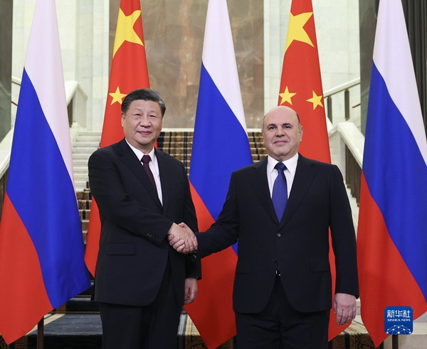 习近平会见俄罗斯总理米舒斯京1_缩小大小.jpg